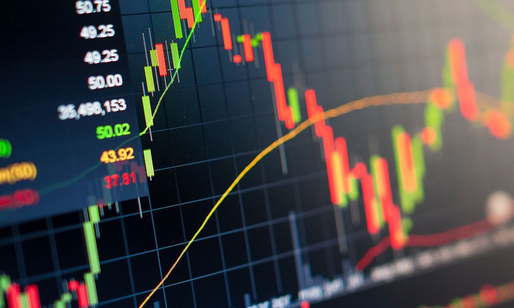 Colorful financial stock chart showing market trends and data analysis on a digital screen.