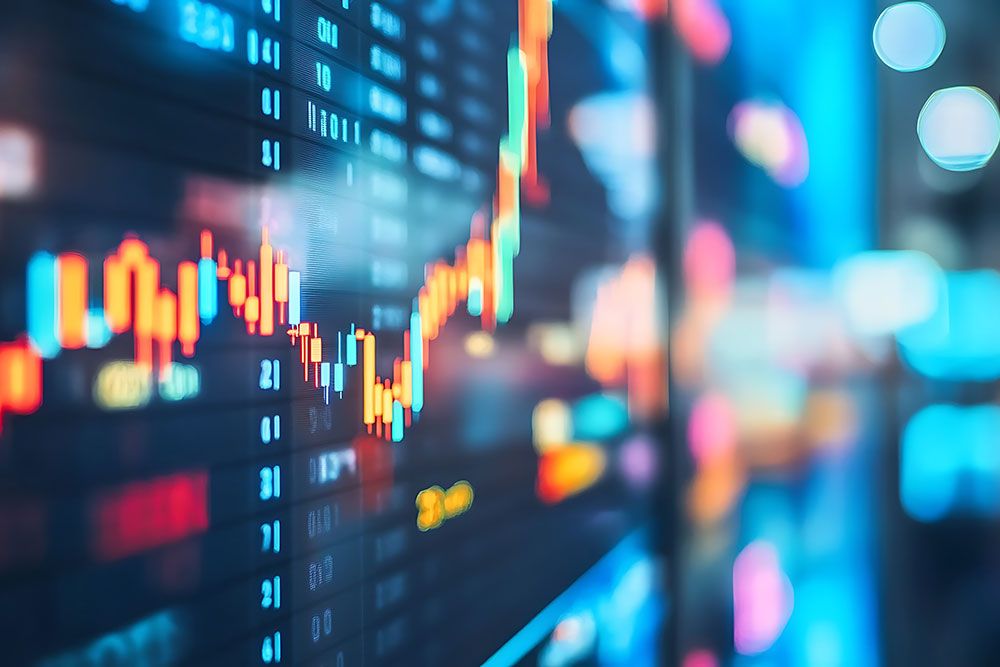 Colorful stock market graphs on a digital screen indicating financial data trends and analysis.