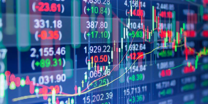 Stock market chart with fluctuating numbers and graphs on a digital screen indicating financial trading dynamics.