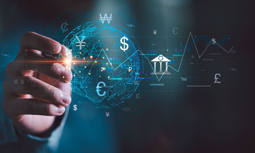 Hand interacting with digital globe, currency symbols, and financial graphs, symbolizing global finance and economy.