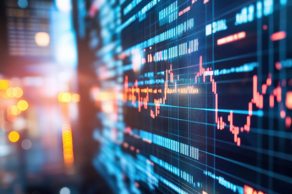 Financial data on a digital screen displaying fluctuating market trends and investment analysis.