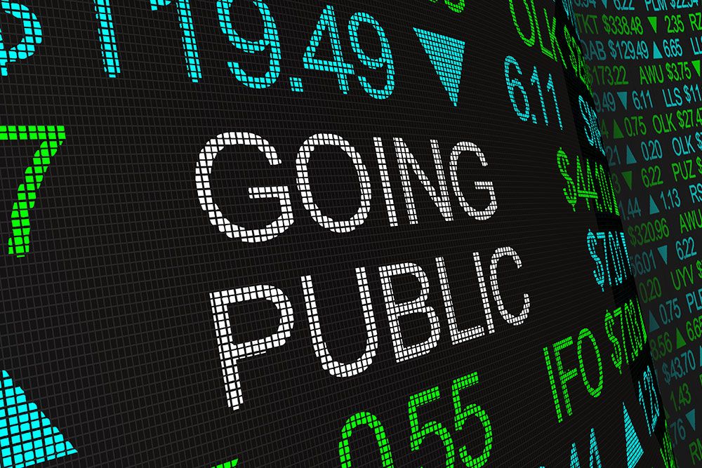 Stock market display showing text 'Going Public' and financial data, indicating a company's IPO process.