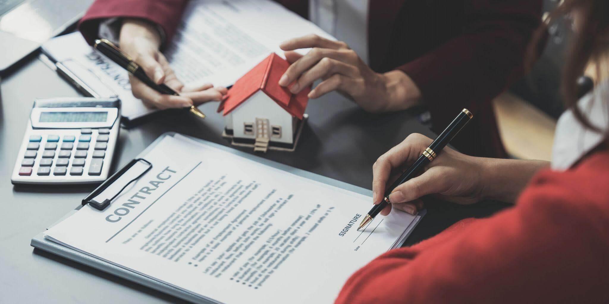 Couple reviewing commercial lease costs with an attorney